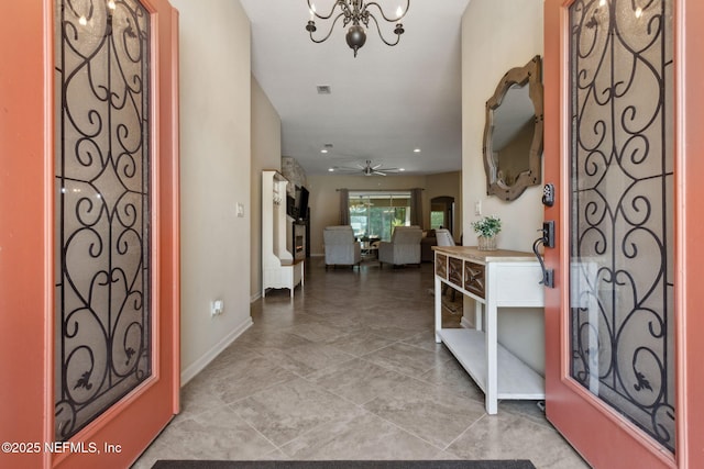 79653 Plummers Creek Dr, Yulee, FL 32097 - foyer featuring a chandelier, a ceiling fan, baseboards, and recessed lighting
