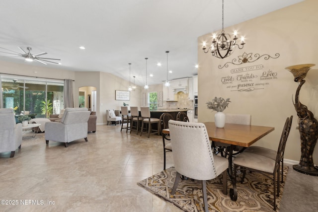 79653 Plummers Creek Dr, Yulee, FL 32097 - dining space with a chandelier, arched walkways, a ceiling fan, and recessed lighting