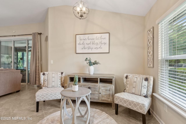 79653 Plummers Creek Dr, Yulee, FL 32097 - living area with plenty of natural light, a chandelier, vaulted ceiling, and tile patterned floors
