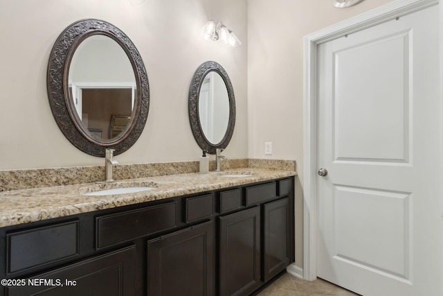 79653 Plummers Creek Dr, Yulee, FL 32097 - bathroom featuring double vanity and tile patterned flooring