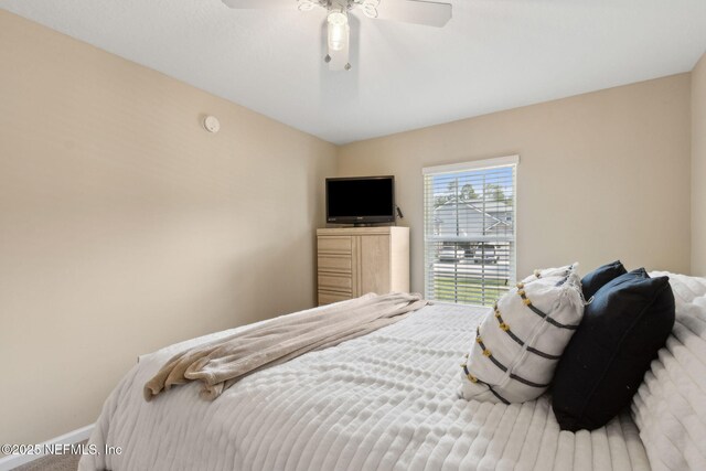 79653 Plummers Creek Dr, Yulee, FL 32097 - bedroom with baseboards, a ceiling fan, and carpet flooring