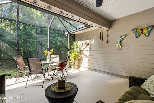 79653 Plummers Creek Dr, Yulee, FL 32097 - sunroom featuring outdoor dining area and a ceiling fan