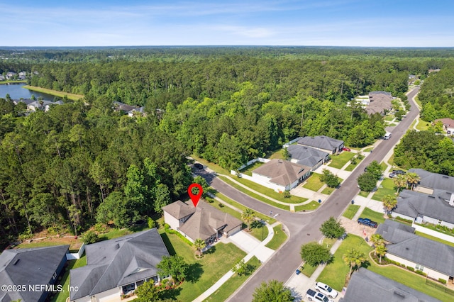 79653 Plummers Creek Dr, Yulee, FL 32097 - aerial view of property's location with a heavily wooded area and nearby suburban area