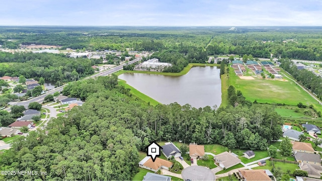 2097 Frogmore Dr, Middleburg, FL 32068 - aerial view of property and surrounding area featuring a nearby body of water, a heavily wooded area, and nearby suburban area