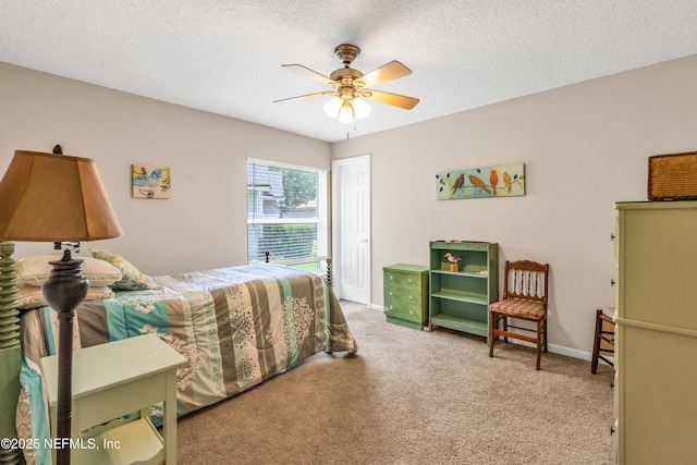 2097 Frogmore Dr, Middleburg, FL 32068 - carpeted bedroom with a ceiling fan, a textured ceiling, and baseboards