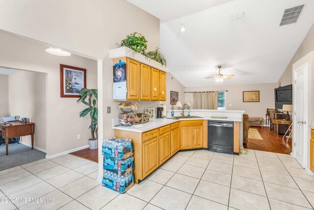2097 Frogmore Dr, Middleburg, FL 32068 - kitchen featuring dishwasher, a peninsula, light tile patterned flooring, light countertops, and high vaulted ceiling