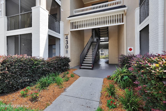 430 Timberwalk Ct Unit 1023, Ponte Vedra Beach, FL 32082 - doorway to property with stucco siding and brick siding