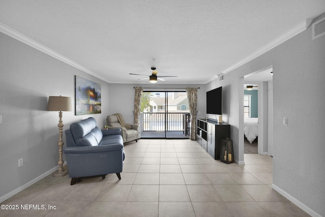 430 Timberwalk Ct Unit 1023, Ponte Vedra Beach, FL 32082 - living area featuring crown molding, healthy amount of natural light, a ceiling fan, baseboards, and a textured ceiling