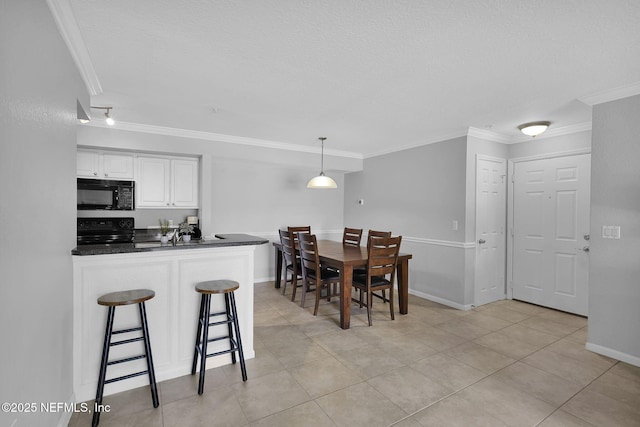430 Timberwalk Ct Unit 1023, Ponte Vedra Beach, FL 32082 - dining area with crown molding, light tile patterned flooring, and baseboards
