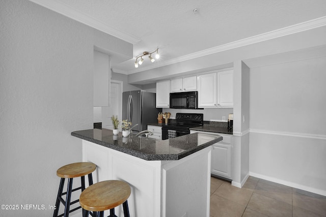 430 Timberwalk Ct Unit 1023, Ponte Vedra Beach, FL 32082 - kitchen featuring black appliances, a kitchen bar, ornamental molding, white cabinets, and light tile patterned flooring