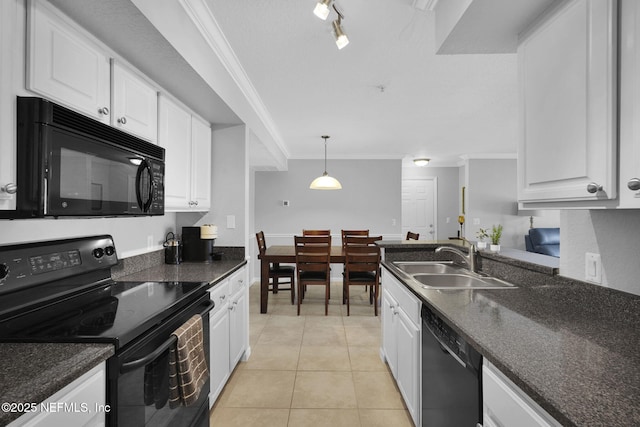 430 Timberwalk Ct Unit 1023, Ponte Vedra Beach, FL 32082 - kitchen with black appliances, a sink, white cabinets, and crown molding