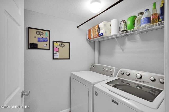 430 Timberwalk Ct Unit 1023, Ponte Vedra Beach, FL 32082 - laundry room with washer and clothes dryer, a textured ceiling, and a textured wall