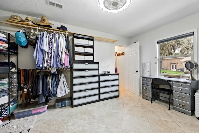 13900 County Road 13 N, Saint Augustine, FL 32092 - walk in closet featuring light tile patterned floors