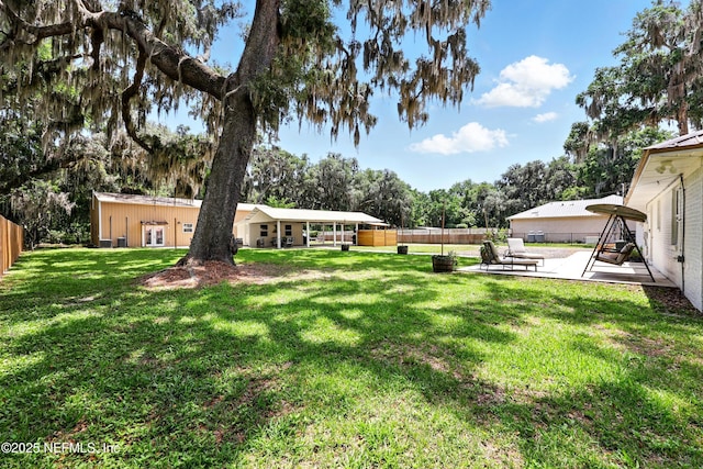 13900 County Road 13 N, Saint Augustine, FL 32092 - view of yard featuring a patio and view of wooded area