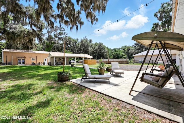 13900 County Road 13 N, Saint Augustine, FL 32092 - view of yard with french doors, a patio, and view of wooded area