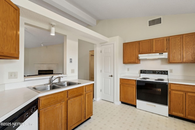 4585 Arrow Wind Ln, Jacksonville, FL 32258 - kitchen with range with electric stovetop, under cabinet range hood, a sink, white dishwasher, and light countertops
