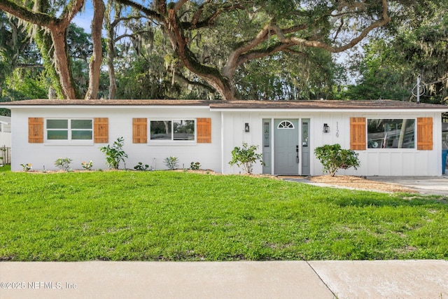 1129 Sebago Ave N, Jacksonville, FL 32233 - single story home featuring board and batten siding and a front yard