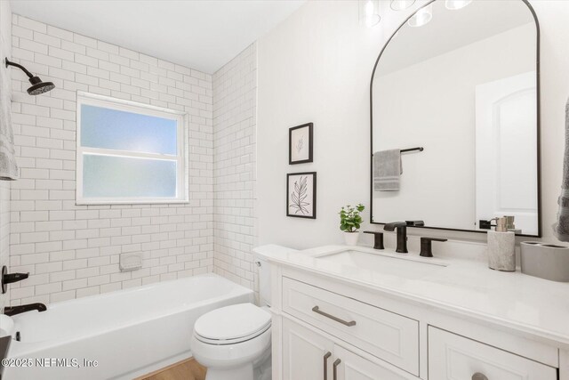 1129 Sebago Ave N, Jacksonville, FL 32233 - bathroom with vanity, toilet, and shower / bathtub combination