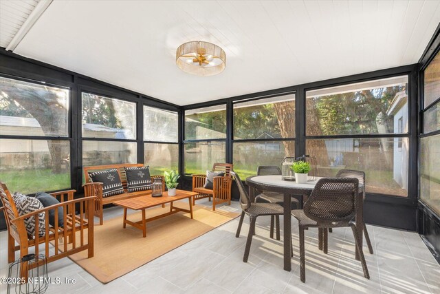 1129 Sebago Ave N, Jacksonville, FL 32233 - sunroom with an outdoor hangout area
