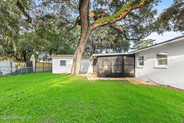 1129 Sebago Ave N, Jacksonville, FL 32233 - view of yard with a sunroom