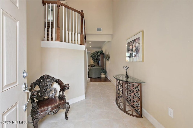 13409 Isla Vista Dr, Jacksonville, FL 32224 - tiled entrance foyer featuring baseboards and a high ceiling