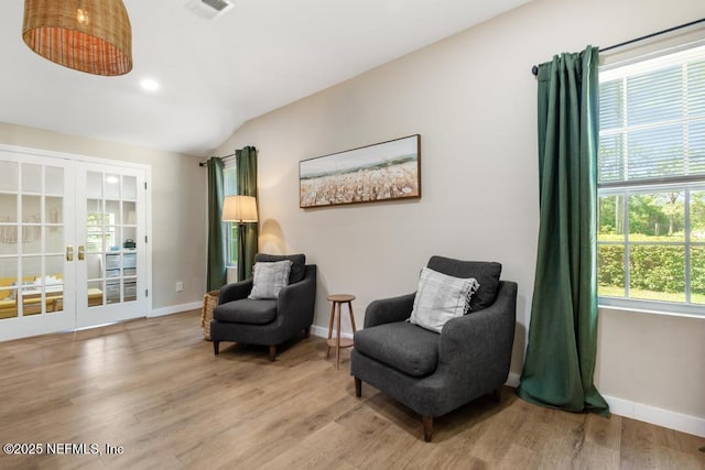 86290 Weldon Ave, Yulee, FL 32097 - sitting room featuring baseboards, light wood-style floors, vaulted ceiling, french doors, and recessed lighting