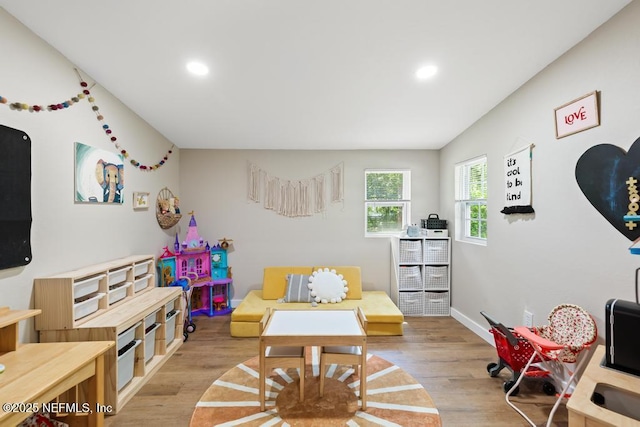 86290 Weldon Ave, Yulee, FL 32097 - living room with light wood finished floors, recessed lighting, and baseboards