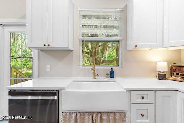 86290 Weldon Ave, Yulee, FL 32097 - kitchen featuring dishwasher, a sink, white cabinetry, and light countertops