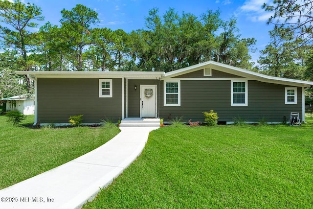 86290 Weldon Ave, Yulee, FL 32097 - ranch-style house with a front yard