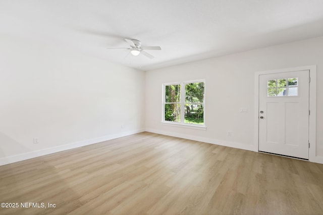 771 W 4th St, Saint Augustine, FL 32084 - entryway with ceiling fan, light wood finished floors, and baseboards