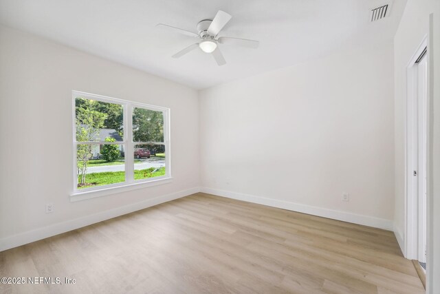 771 W 4th St, Saint Augustine, FL 32084 - unfurnished room featuring light wood finished floors, baseboards, and a ceiling fan