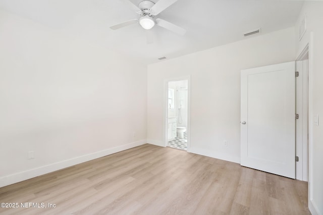 771 W 4th St, Saint Augustine, FL 32084 - spare room featuring a ceiling fan, light wood-style floors, and baseboards