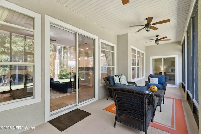 86569 N Hampton Club Way, Fernandina Beach, FL 32034 - sunroom / solarium with a ceiling fan and an outdoor living space