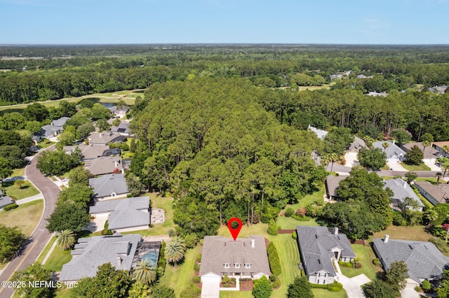 86569 N Hampton Club Way, Fernandina Beach, FL 32034 - aerial overview of property's location featuring a heavily wooded area and nearby suburban area