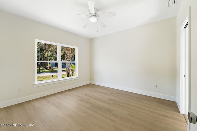 763 W 4th St, Saint Augustine, FL 32084 - spare room with baseboards, light wood-style floors, and ceiling fan