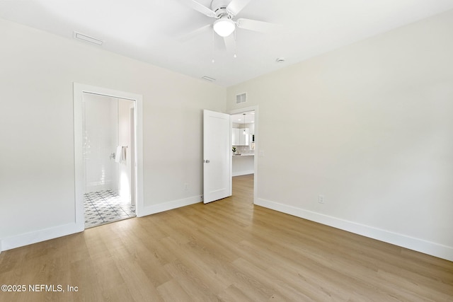 763 W 4th St, Saint Augustine, FL 32084 - unfurnished bedroom featuring baseboards, light wood-style flooring, and a ceiling fan