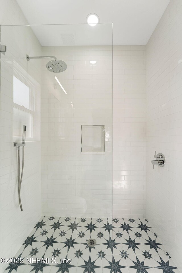 763 W 4th St, Saint Augustine, FL 32084 - bathroom featuring tiled shower