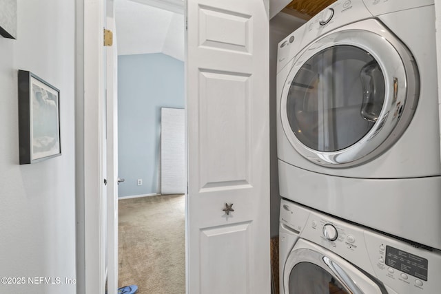 118 Governor St Unit 208, Green Cove Springs, FL 32043 - washroom with estacked washer and dryer, carpet, and baseboards
