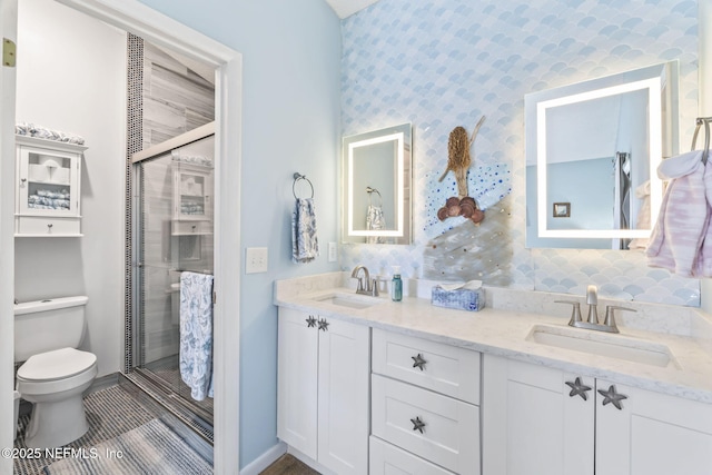 118 Governor St Unit 208, Green Cove Springs, FL 32043 - bathroom featuring a shower stall, double vanity, toilet, and baseboards