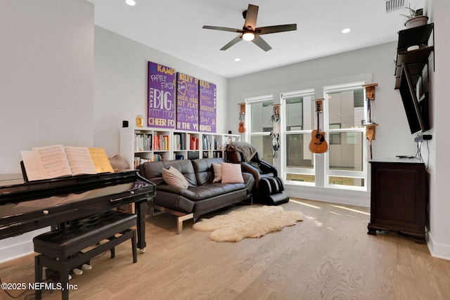 1622 Bridgeton Dr, Jacksonville, FL 32207 - living room with wood finished floors, a ceiling fan, and recessed lighting