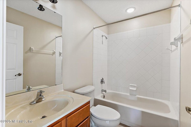 2347 W Clovelly Ln, Saint Augustine, FL 32092 - full bathroom with vanity, toilet,  shower combination, and a textured ceiling