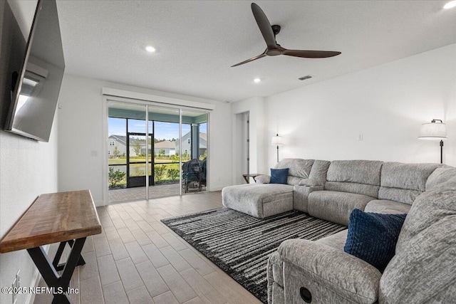 50 Dollar Ct, Saint Augustine, FL 32092 - living room with ceiling fan, wood finished floors, recessed lighting, and a textured ceiling
