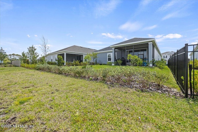 50 Dollar Ct, Saint Augustine, FL 32092 - rear view of property with a sunroom
