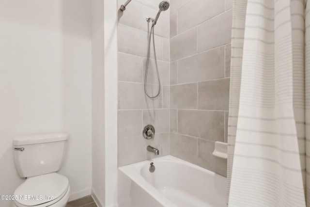 85541 Stonehurst Pkwy, Fernandina Beach, FL 32034 - bathroom with shower / bathtub combination with curtain, toilet, and baseboards