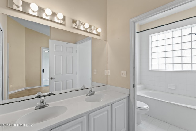 709 Augusta Cir, Saint Augustine, FL 32086 - full bathroom featuring toilet, double vanity, a tub, and tile patterned flooring