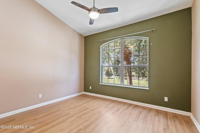 709 Augusta Cir, Saint Augustine, FL 32086 - spare room with light wood finished floors, a ceiling fan, baseboards, and lofted ceiling