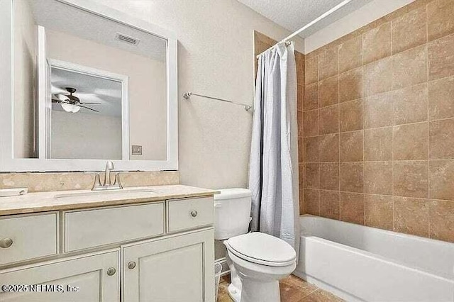 97163 Bluff View Cir, Yulee, FL 32097 - bathroom with vanity, shower / bathtub combination with curtain, a ceiling fan, and tile patterned floors