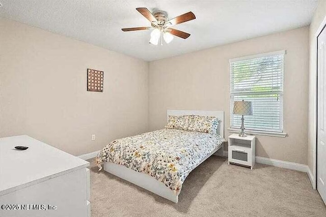 97163 Bluff View Cir, Yulee, FL 32097 - bedroom with carpet floors and ceiling fan