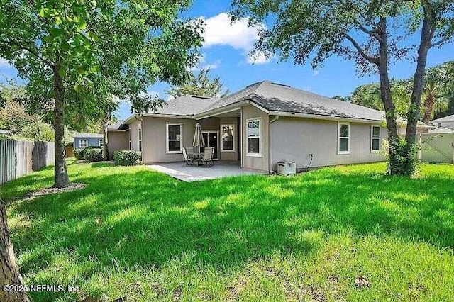 97163 Bluff View Cir, Yulee, FL 32097 - rear view of property featuring a patio and stucco siding