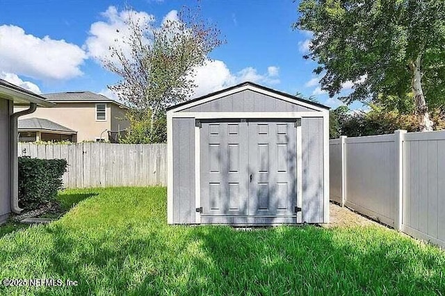 97163 Bluff View Cir, Yulee, FL 32097 - view of shed featuring a fenced backyard
